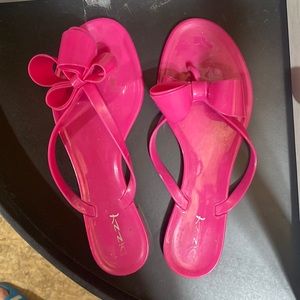Hot Pink jelly flip flops with bow